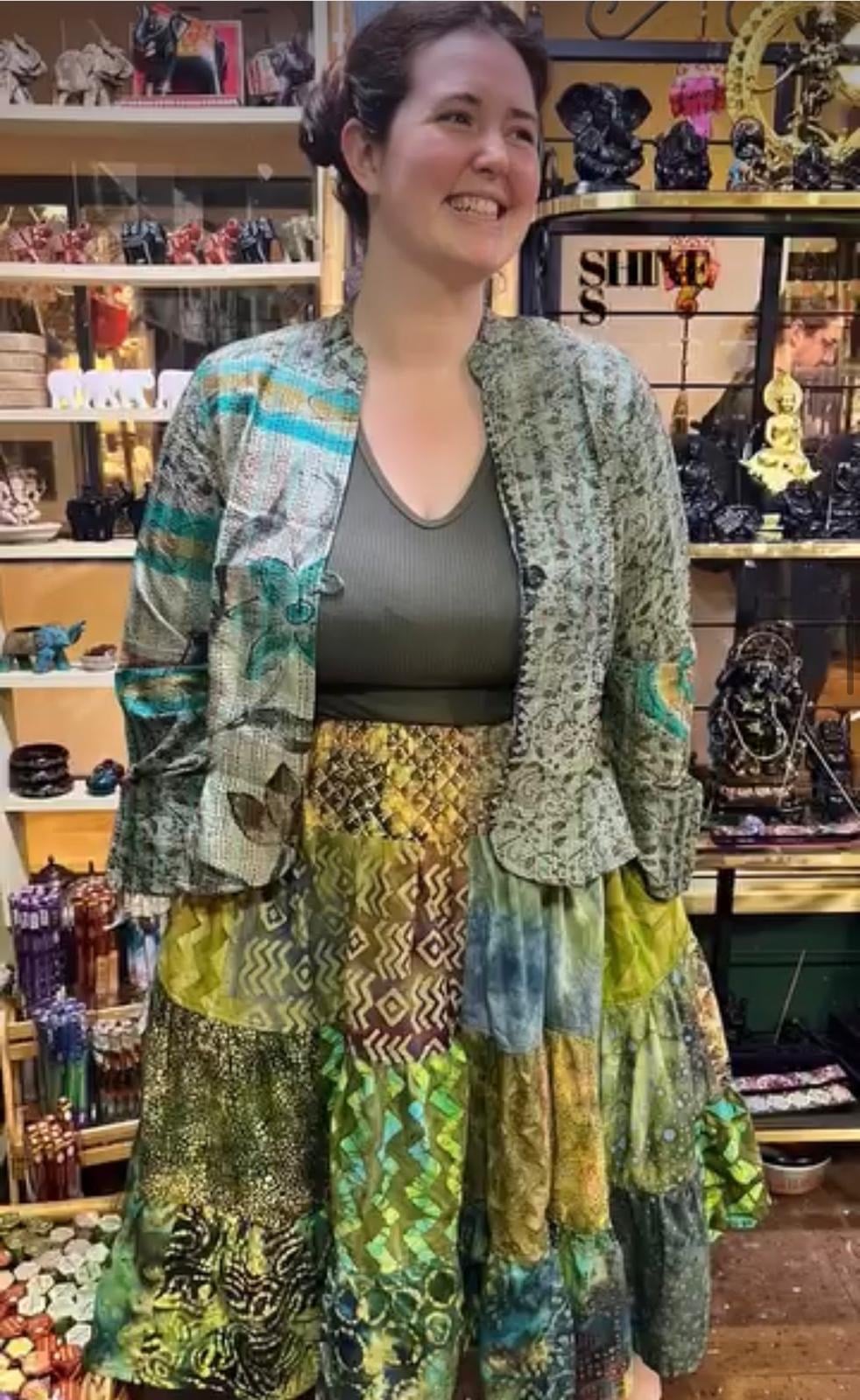 Woman in patchwork dress boutique