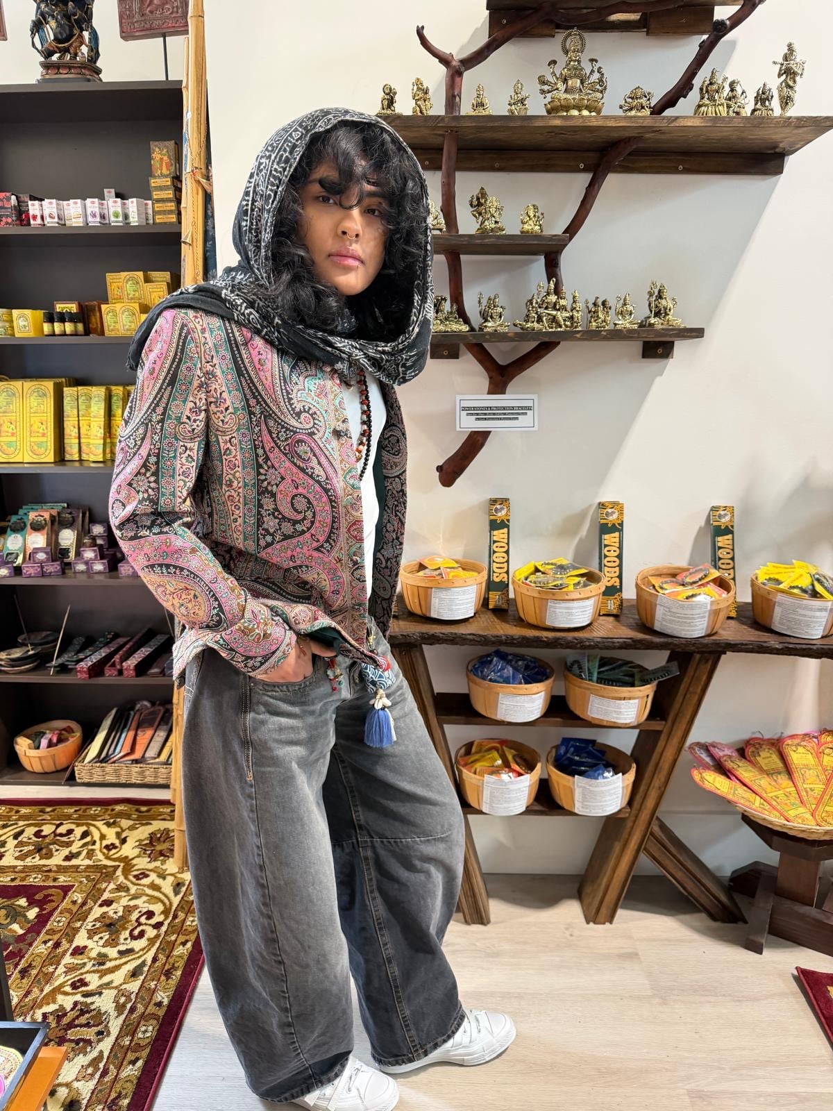 Woman in spiritual shop interior